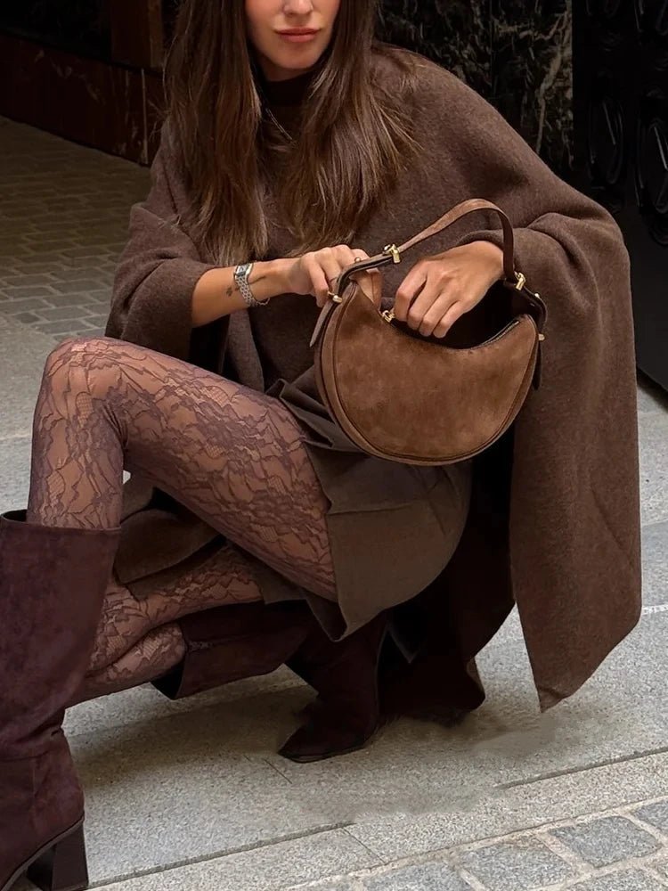 Adelinka stickad poncho