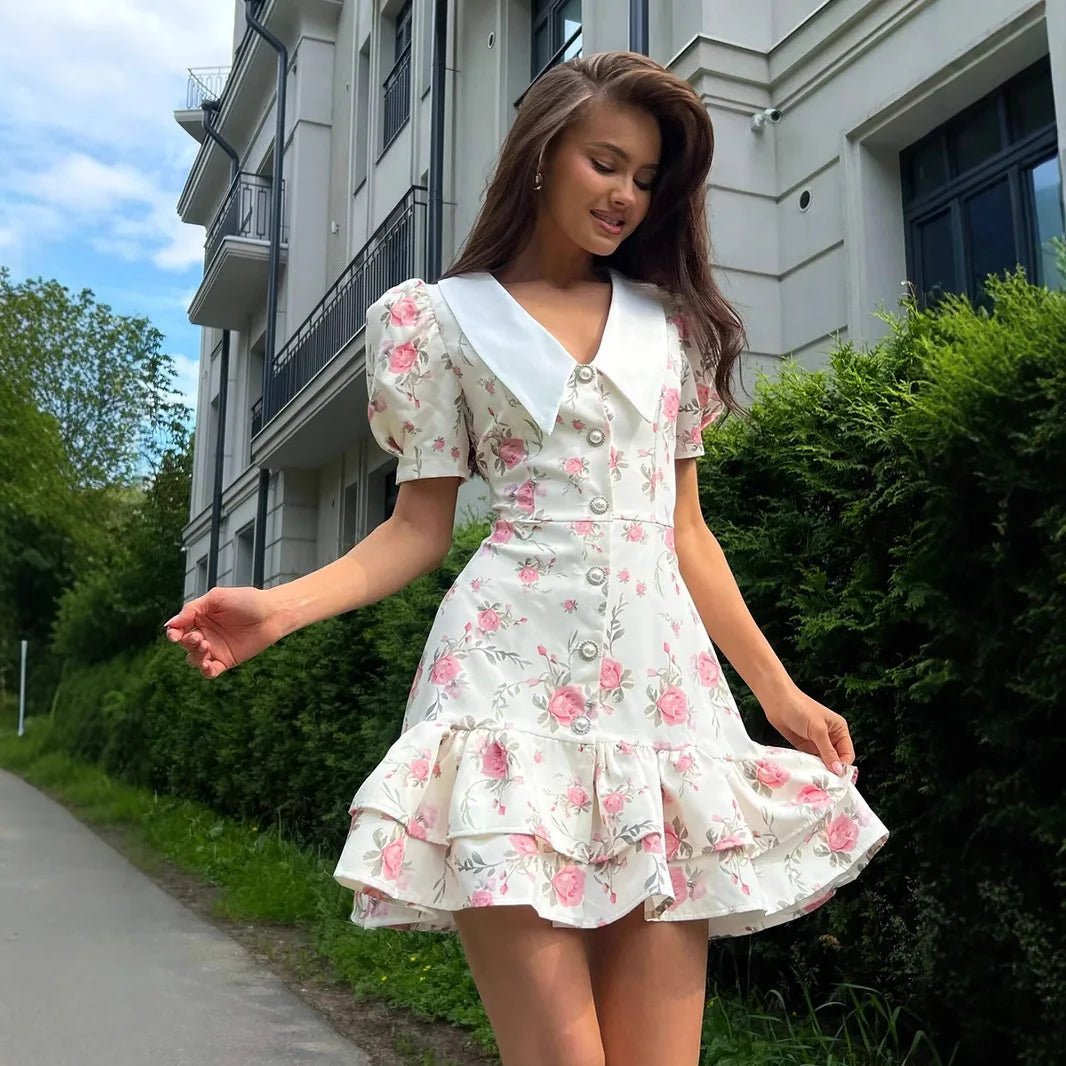 Andromeda blommig miniklänning med puffärmar