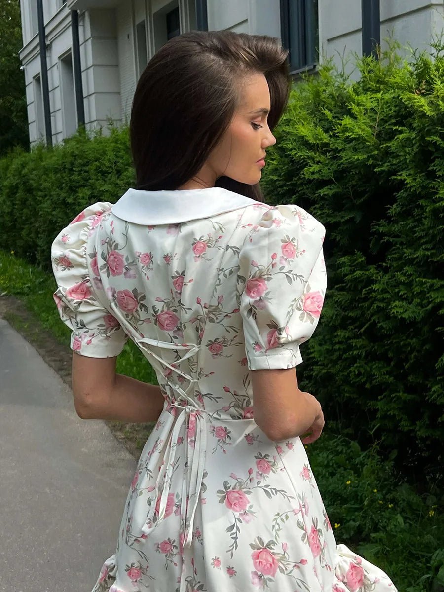 Andromeda blommig miniklänning med puffärmar