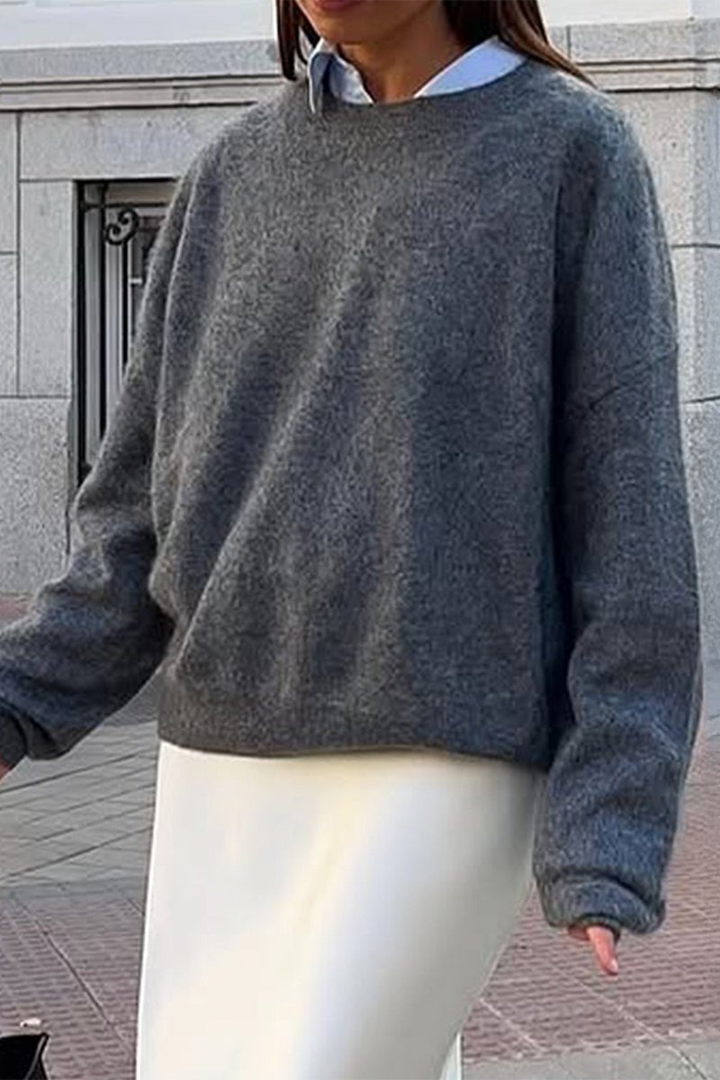Angela ribbstickad tröja