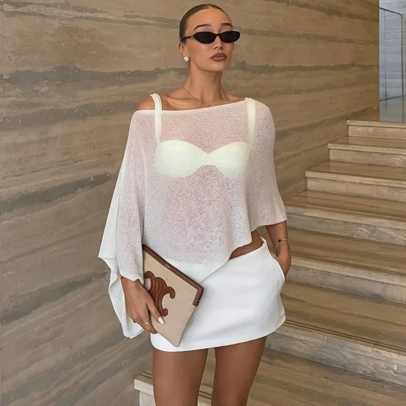 Asymmetrisk genomskinlig ponchotopp