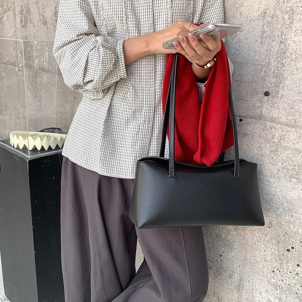 Bianca vadderad tote-axelväska