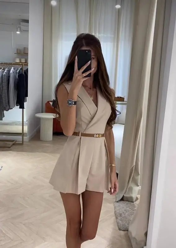 Bianca strukturerad ärmlös jumpsuit med skärp