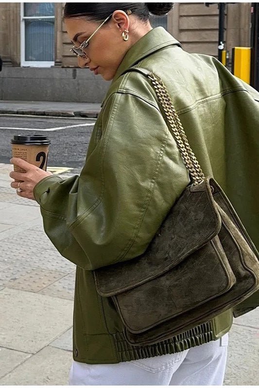 Bilge vintagegrön jacka i konstläder