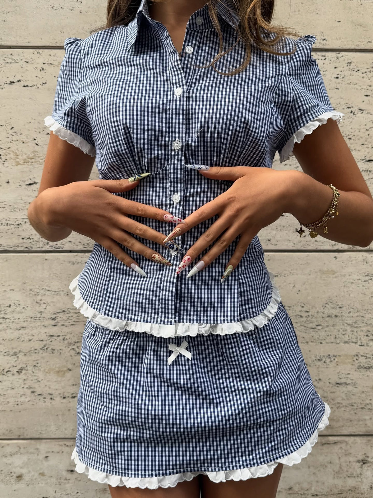 Briannas korta set med figurnära shorts och kjol