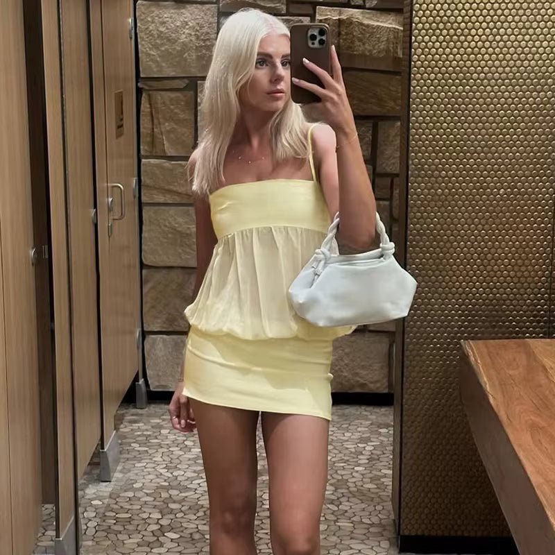 Celeste figurnära miniklänning i mesh med bara axlar