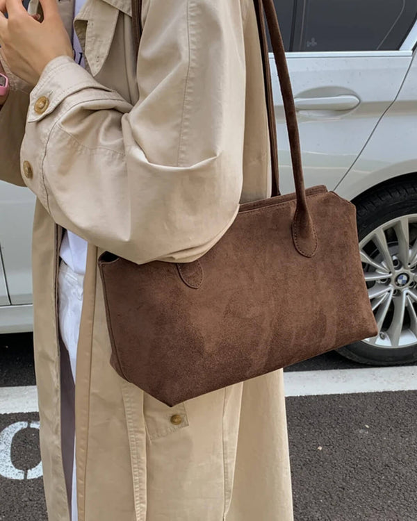 Claudine axelremsväska i mockaimitation