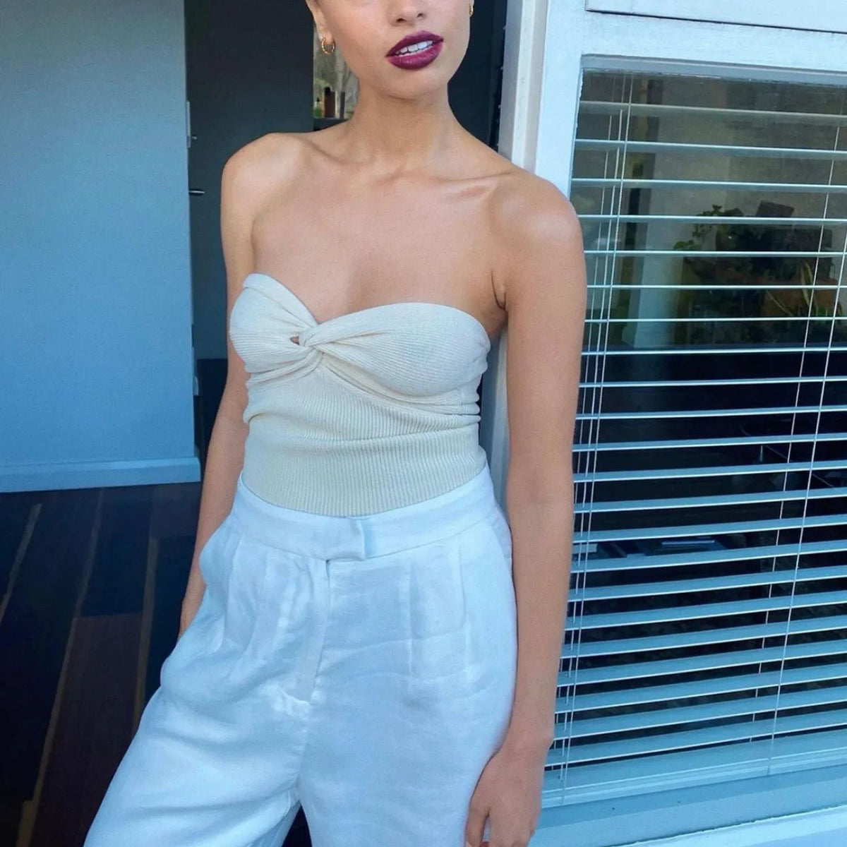 Iris axelbandslös off-shouldertopp