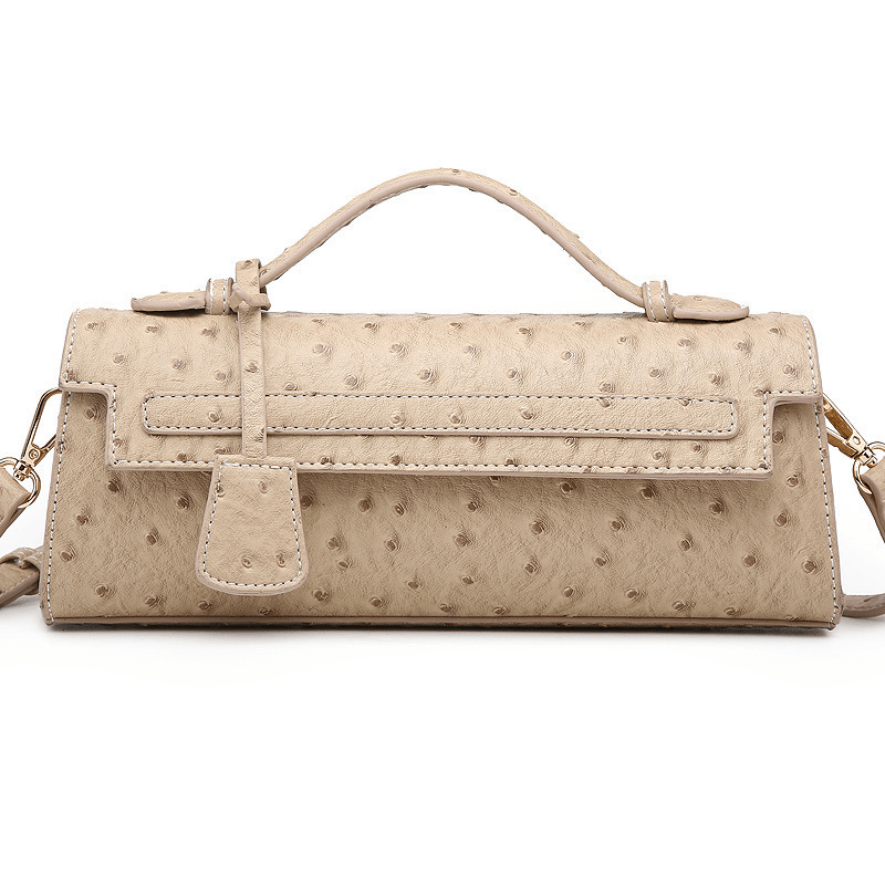 Jasmin clutch med präglat mönster
