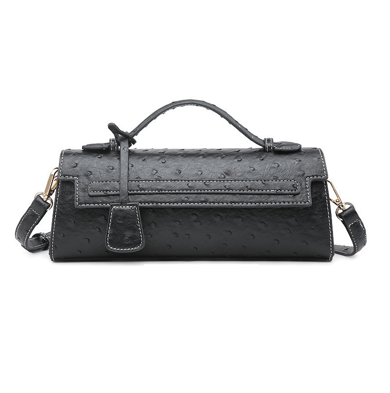 Jasmin clutch med präglat mönster