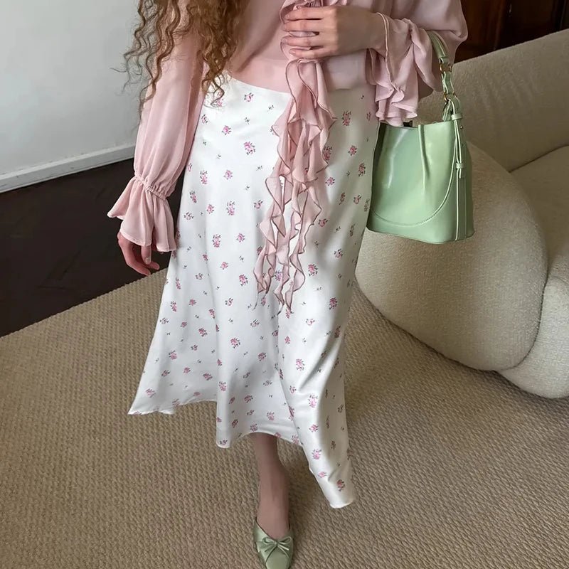 Kate mönstrad satinkjol i midi-modell med hög midja