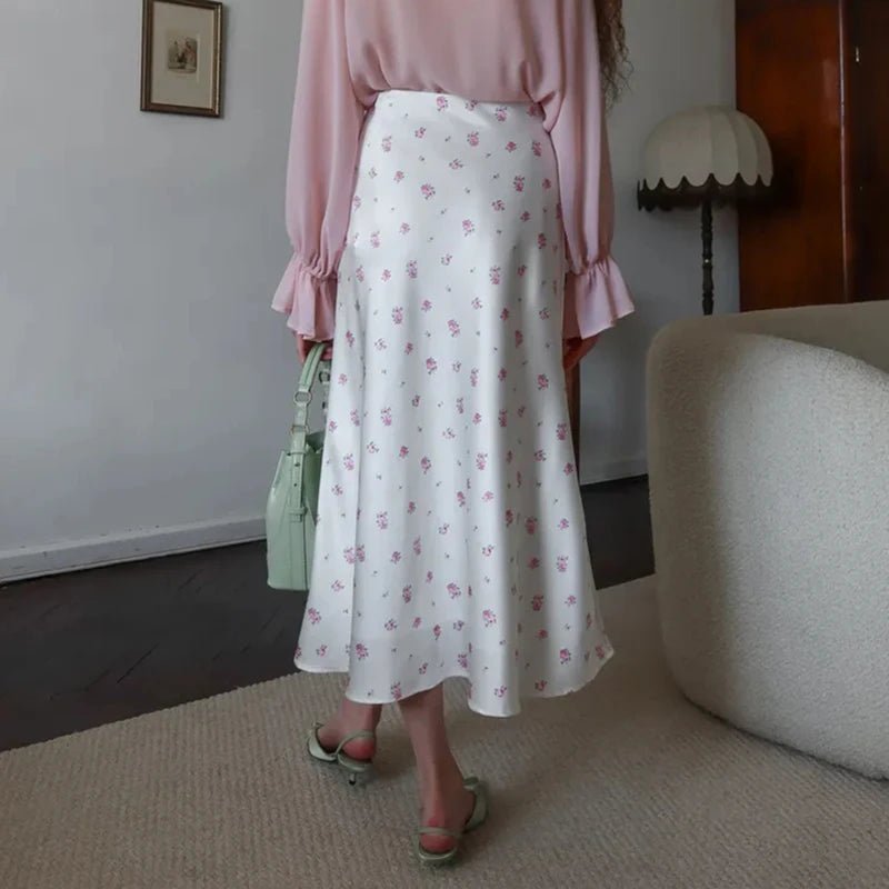 Kate mönstrad satinkjol i midi-modell med hög midja