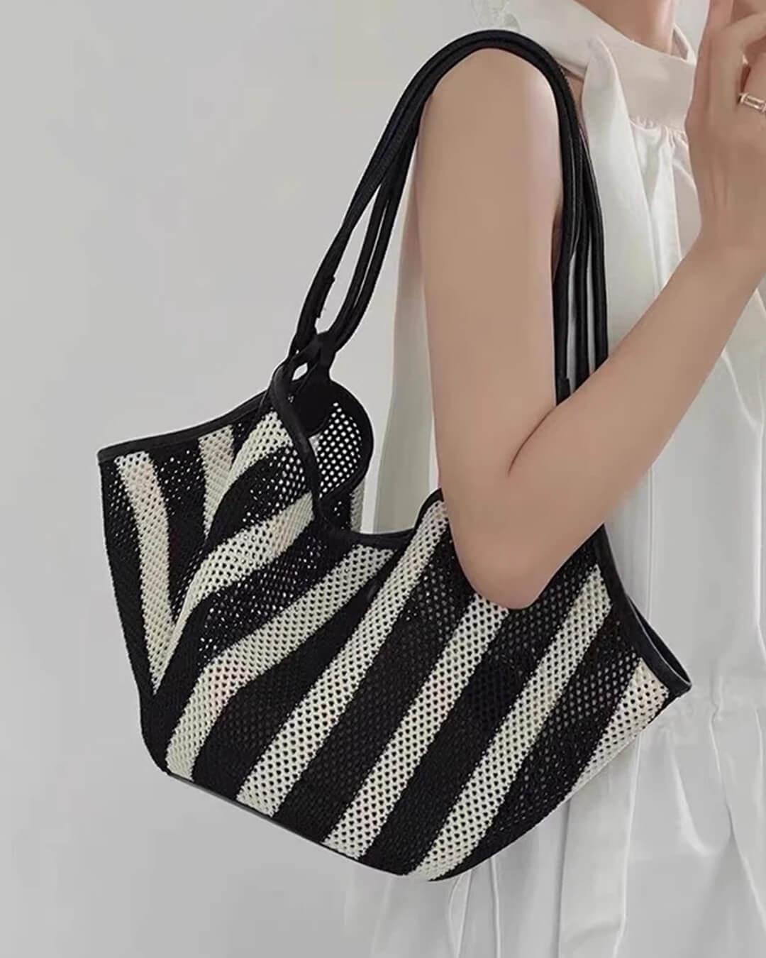 Liam vävd crossbodyväska