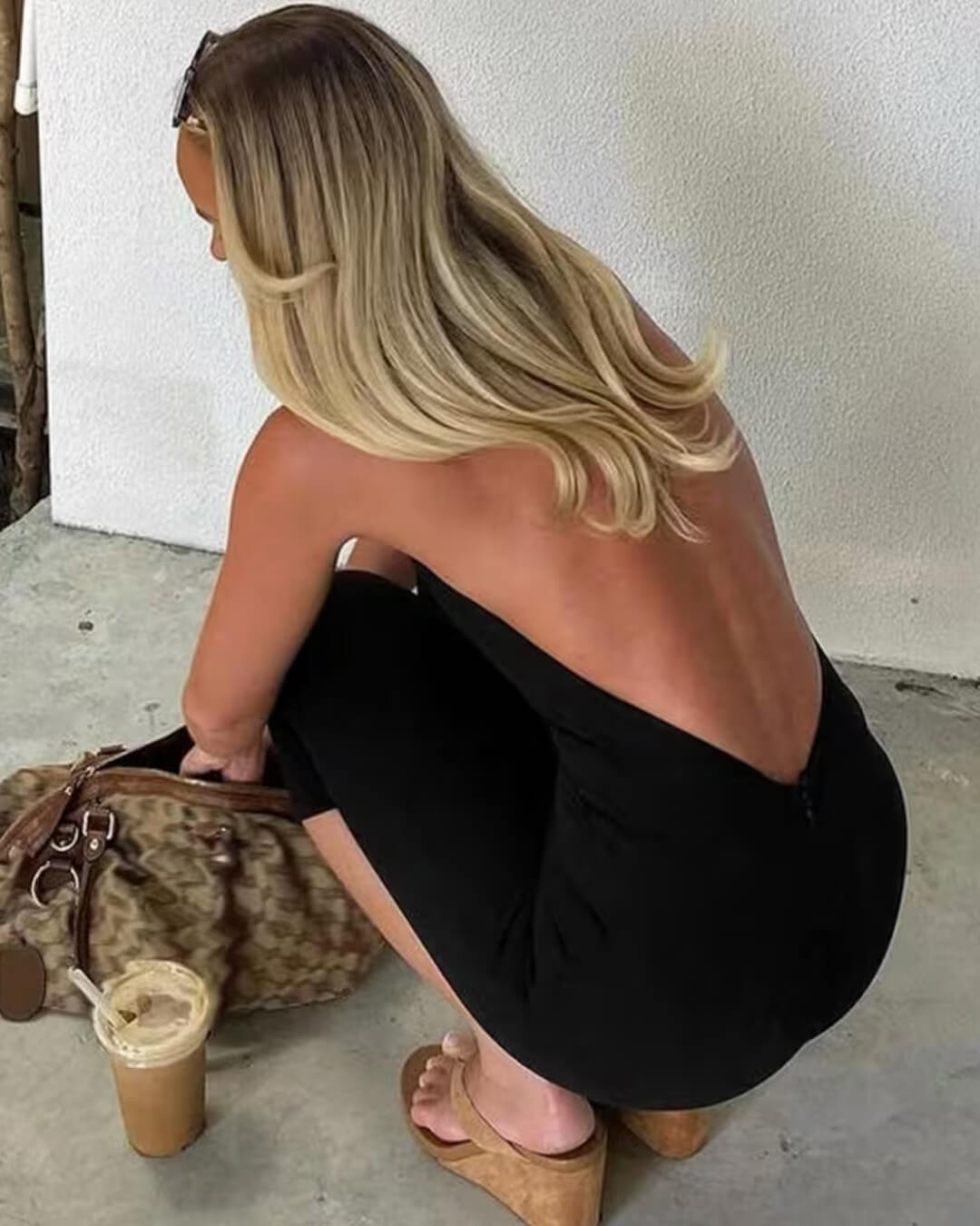 Lucy halterneck-jumpsuit med bar rygg