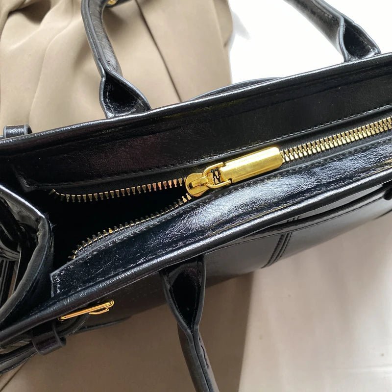 Luna axelväska med bältdetalj