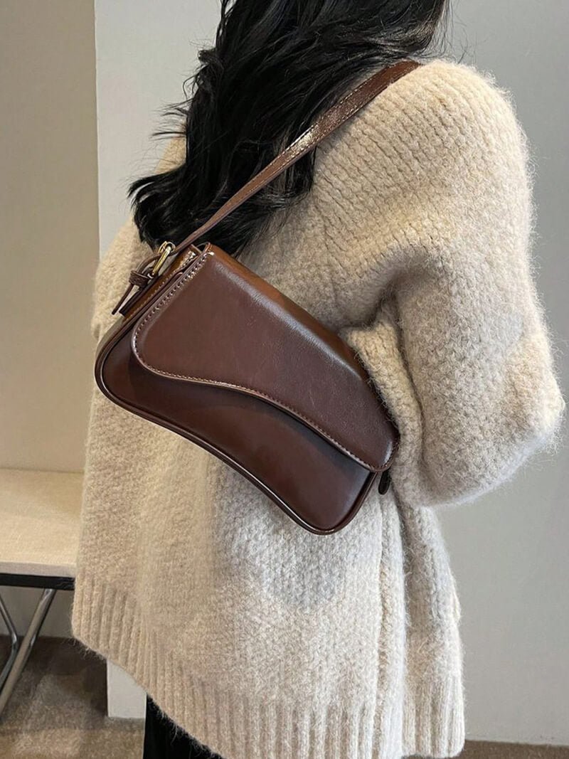Mila axelväska i sadelmodell