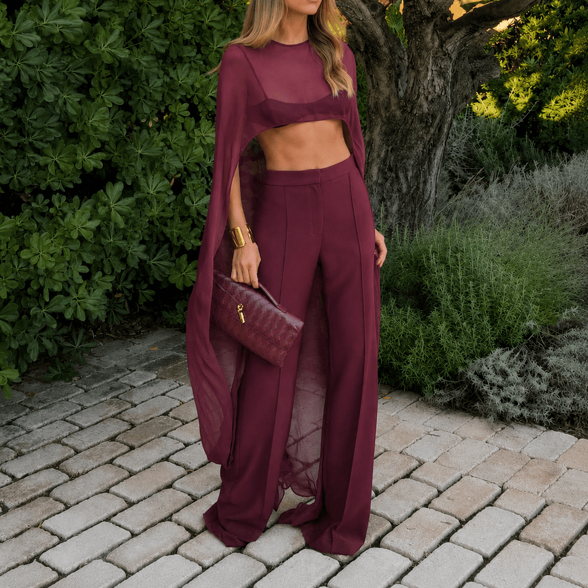 Niamhs prickiga cape med asymmetrisk längd