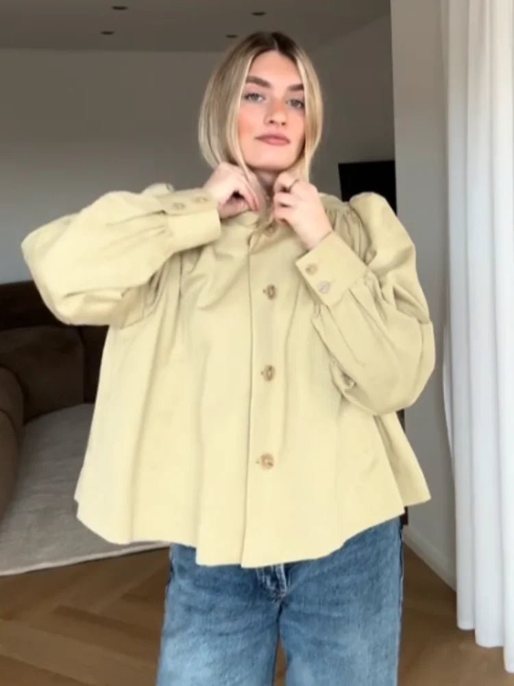 Pia jacka med puffärmar