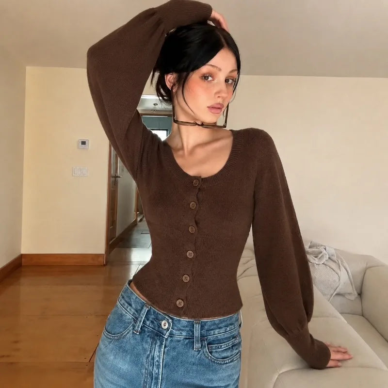Mae stickad cardigan med puffärmar
