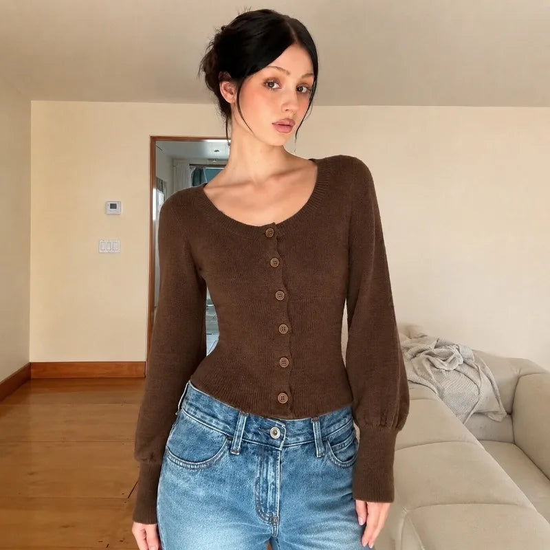 Mae stickad cardigan med puffärmar