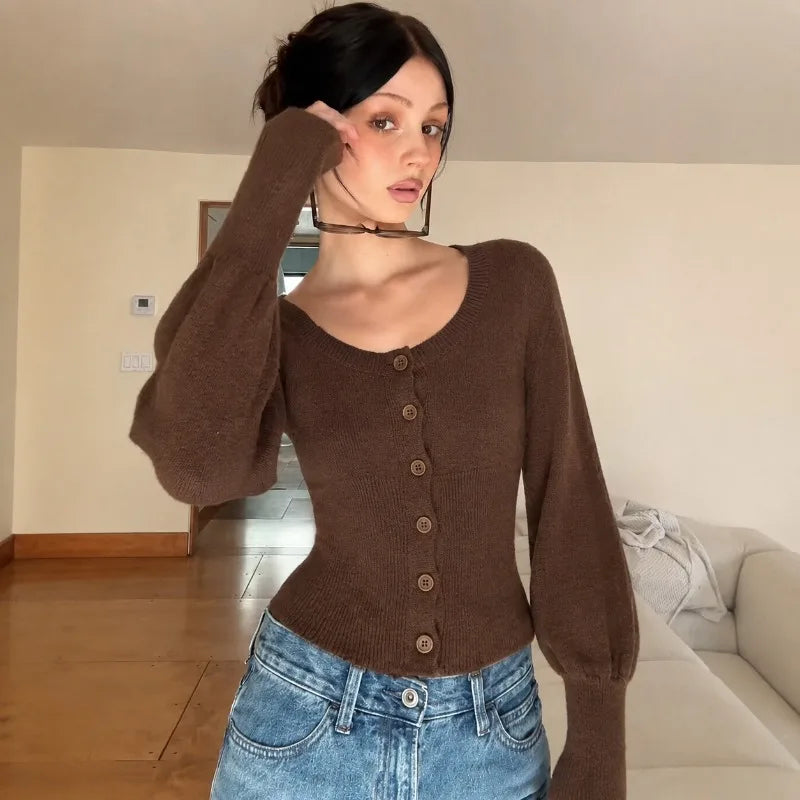Mae stickad cardigan med puffärmar