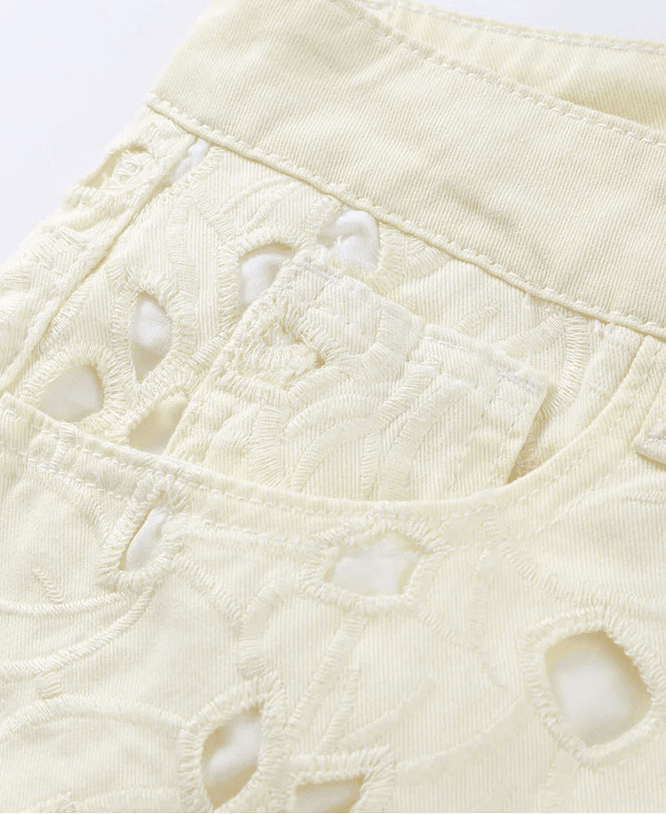 Rachel raka jeans i denim med hög midja och utskurna detaljer