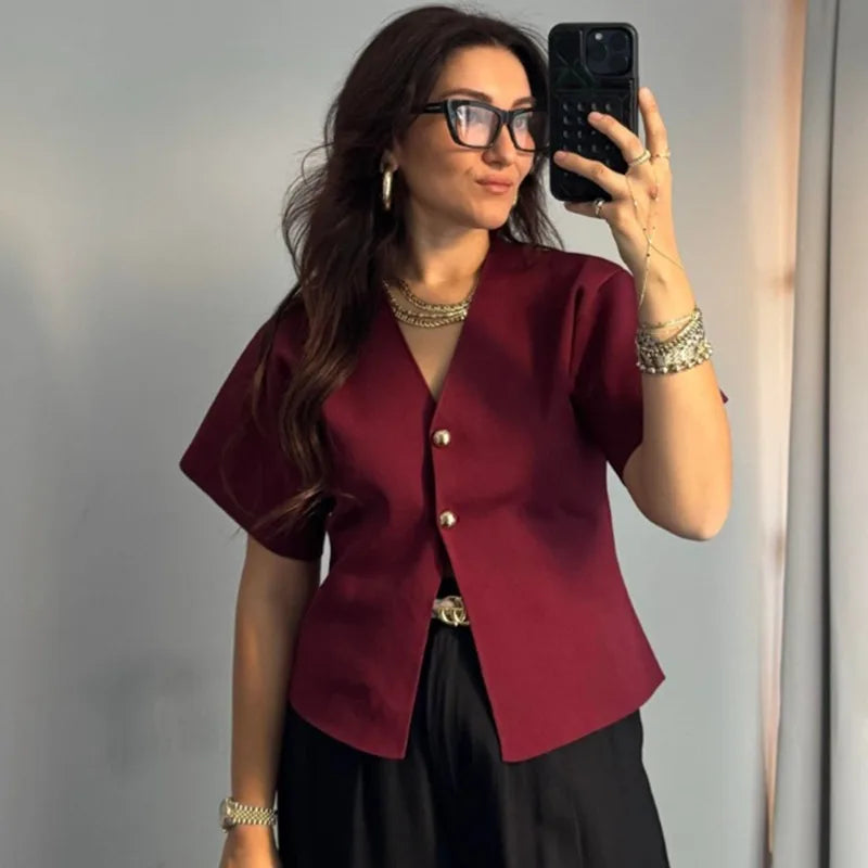 Ribbstickad cardigan med V-ringning och knappar