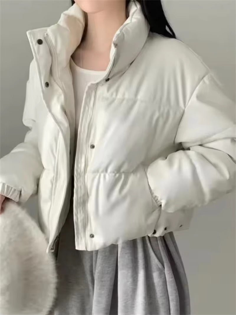 Samantha vadderad jacka i läderimitation