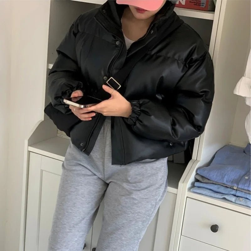 Samantha vadderad jacka i läderimitation