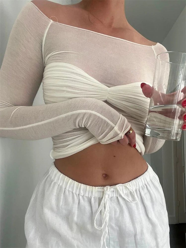 Sara genomskinlig mesh-topp med bara axlar