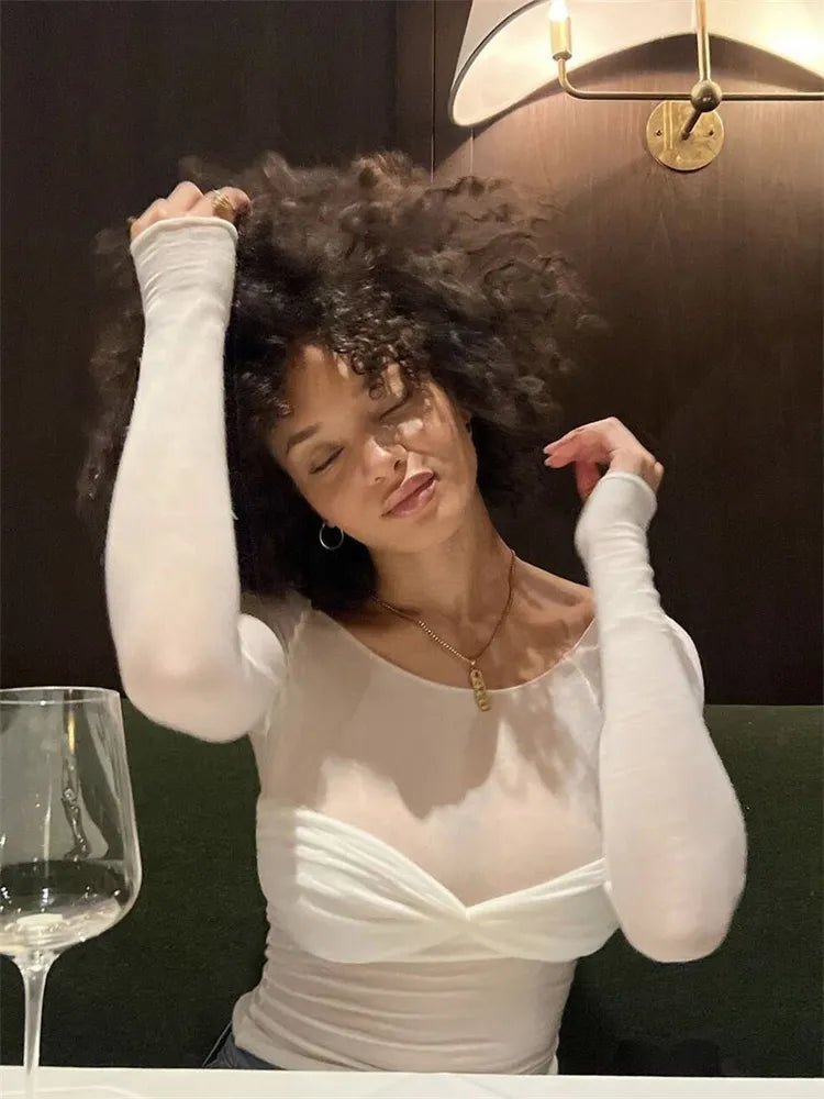 Sara genomskinlig mesh-topp med bara axlar