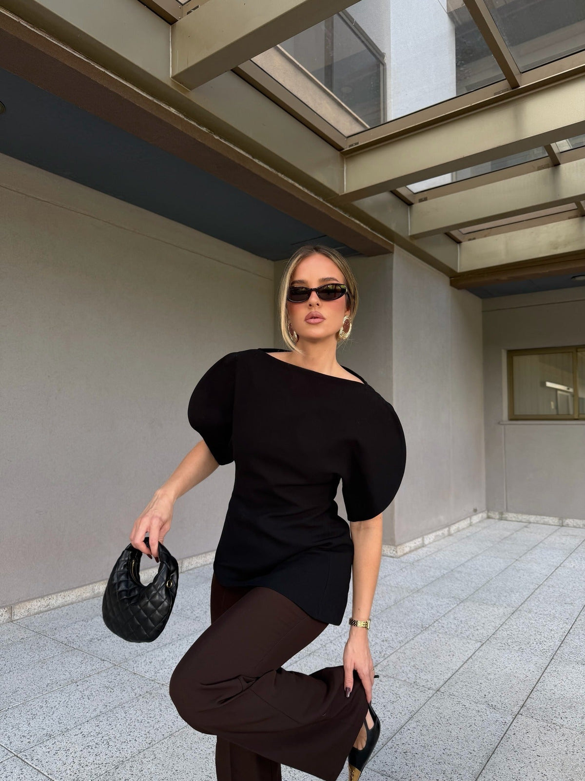 Siennas trikåtopp med ballongärmar
