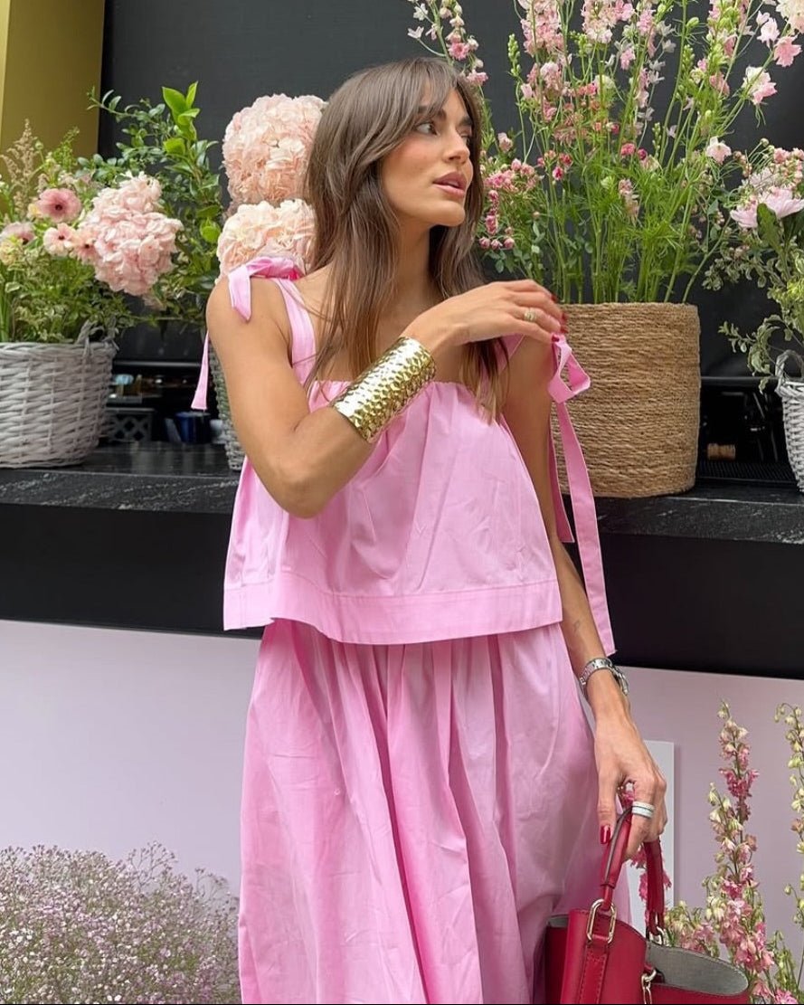 Sophia rosa volangklänning i midilängd med rosett