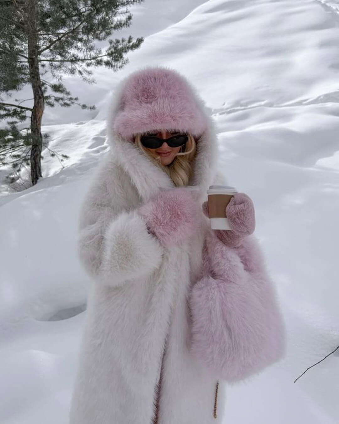 Tracy, hatt i konstpäls