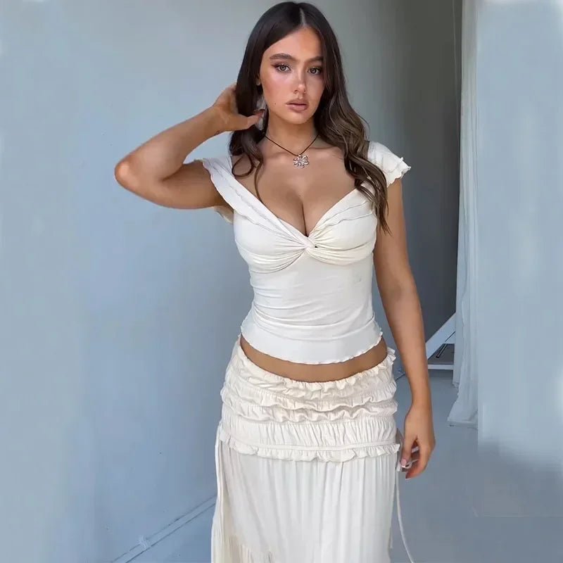 Zendaya set med volangprydd croppad topp och maxikjol