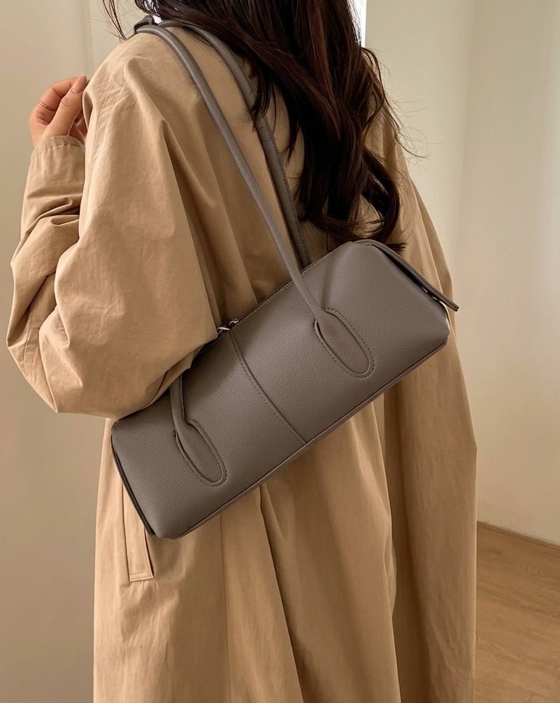 Mira Cylinder Shoulder Bag in taupe grey – styled look